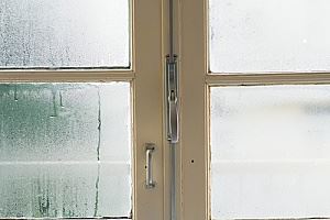 foggy windows in a home that has an air conditioner but needs a dehumidifier